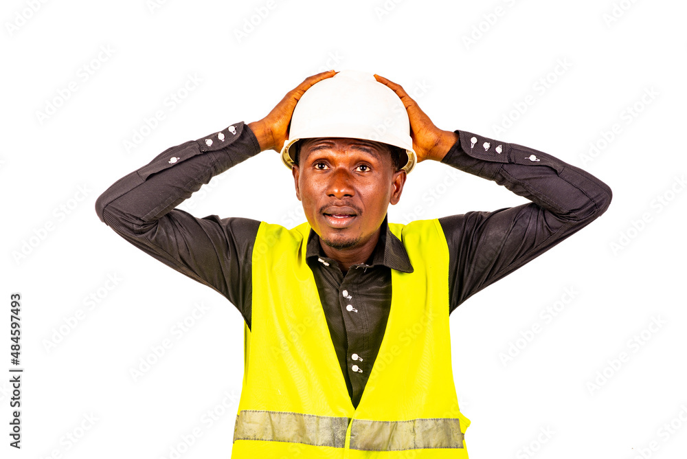 young man engineer holding head with hands. young man engineer holding head with hands.