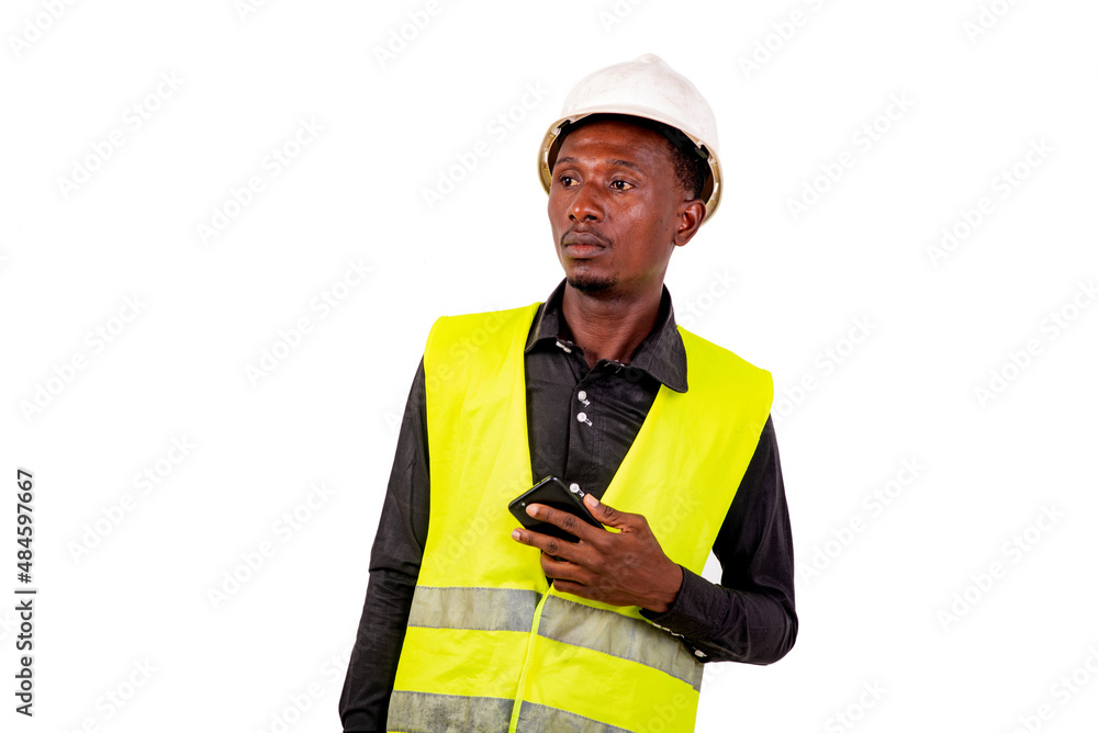 portrait of a male entrepreneur with cellphone looking away. portrait of a male entrepreneur with cellphone looking away.