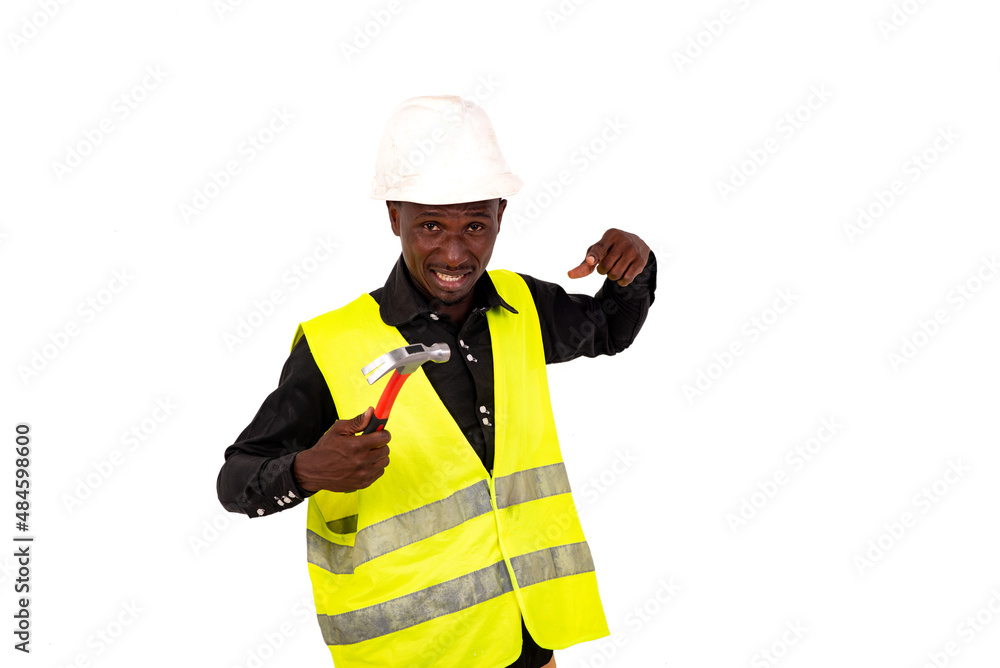 young man engineer holding hammer. young man engineer holding hammer.