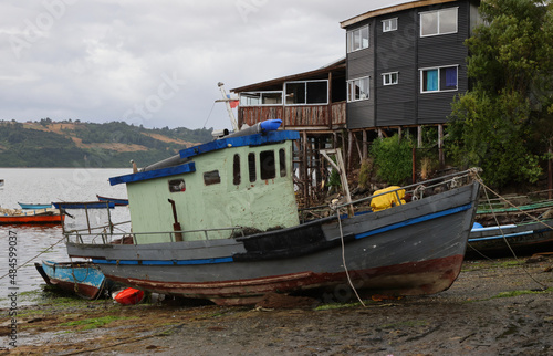 Old boat on the shores of Castro Bay  Chile