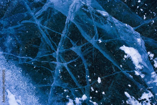 Lake Baikal in winter, snowy winter on the lake, landscape, deep lake in winter, Russia in winter, boat on the shore in winter