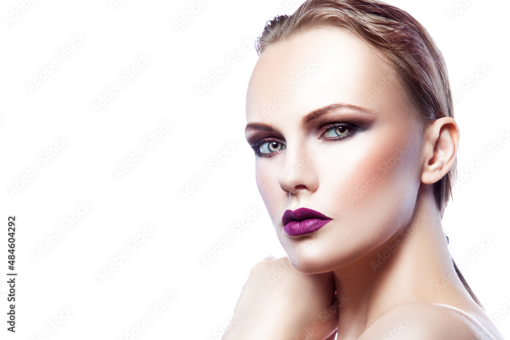 Beauty portrait of a woman with makeup. Copy space on white Beauty portrait of a woman with makeup. Copy space on white