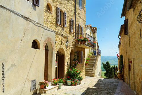 Fototapeta Naklejka Na Ścianę i Meble -  Narrow street of Pienza, a village located in the beautiful Tuscany valley, known as the 'ideal city of the Renaissance' and a 'capital' of pecorino cheese. UNESCO World Heritage Site.