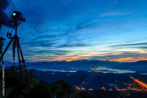 Taking a photo of sunrise in the Dumulmeori, South Korea. photo