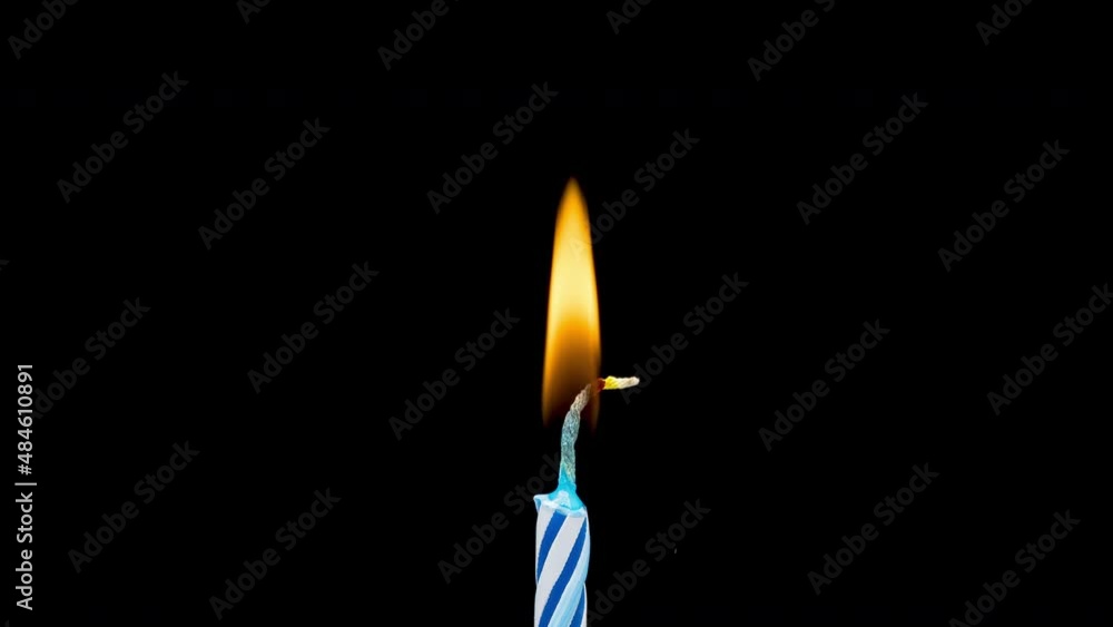 4K Time Lapse of holiday candle - Happy Birthday on black background. Colorful burning candle. Birthday greetings. 4K Time Lapse of holiday candle - Happy Birthday on black background. Colorful burning candle. Birthday greetings.