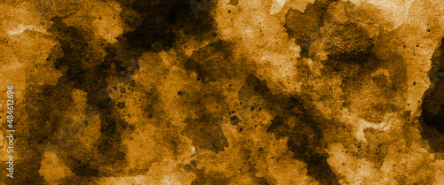 Abstract grunge textured dark gold color abandoned old concrete wall surface background, gold distressed vintage grunge in faded gold spotlight design, abstract textured design from gold dark to light