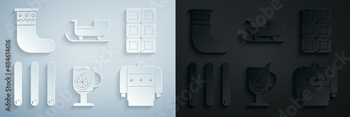 Set Mulled wine with glass of drink, Chocolate bar, Three rolled sticks cinnamon, Christmas sweater, santa claus sleigh and stocking icon. Vector