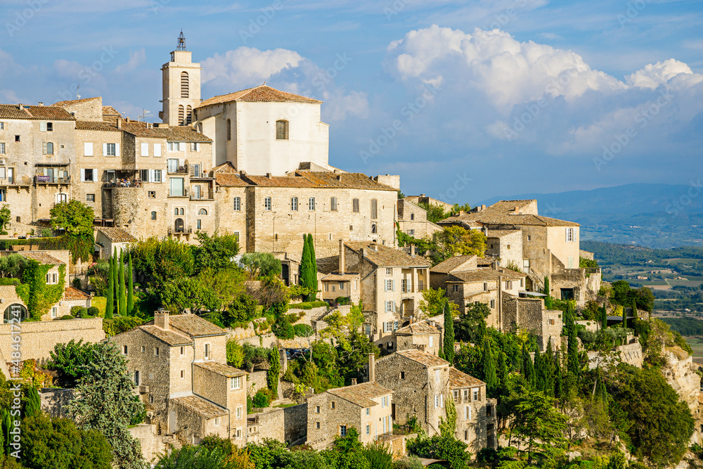 Saint-Firmin church in Gordes village in the Luberon valley during summer  in Provence, France