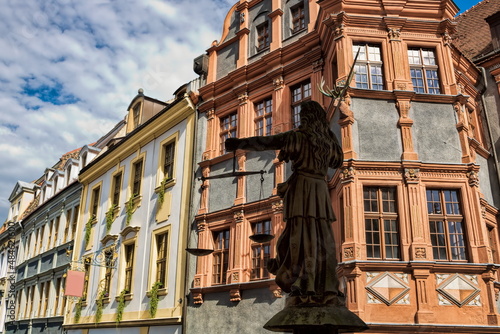 görlitz, deutschland - sanierte häuserzeile mit justiziafigur photo