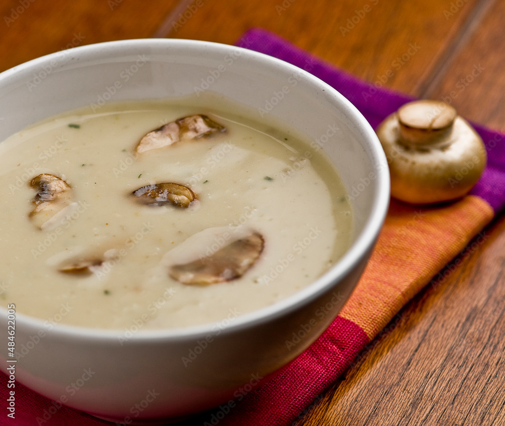Delicious and creamy bowl of hot mushroom soup. Delicious and creamy bowl of hot mushroom soup.