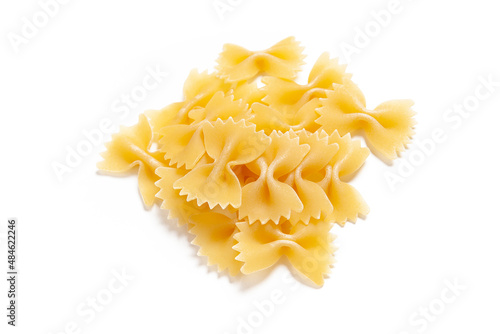  Tasty uncooked pasta on white background.