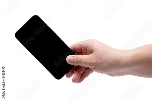 Black smartphone with copy space in male hand isolated on white background.