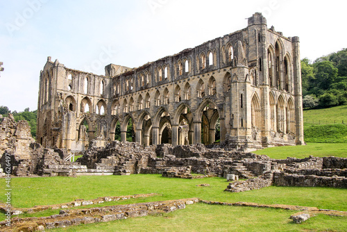 The spectacular ruins of Rievaulx Abbey in Yorkshire, for centuries the home of Cistercian monks until it was seized and destroyed by King Henry VIII in 1538. photo