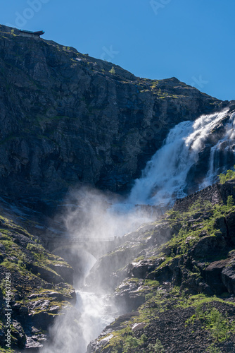Big waterfall and bridge you have to pass when driving to Trollstigen viewpoint  Norway.
