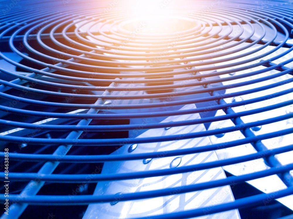 The Close up View of Metal Ventilation Fan not rotating with the shine light. Stock Photo