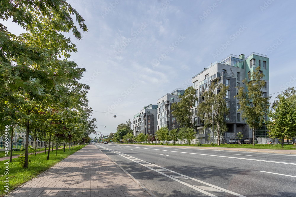 View of a residential building with empty street View of a residential building with empty street