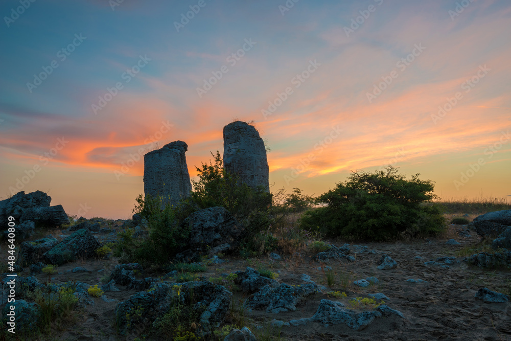 Beautyful sunrise over The Stone Desert Pobiti Kamani - fabulous rock phenomenon in Varna Province, Bulgaria - tourist destination