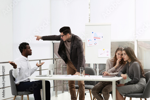 African American man suffering from racial discrimination at work