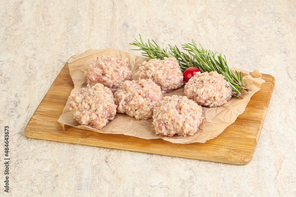 Traditional homemade raw pork meatballs Traditional homemade raw pork meatballs