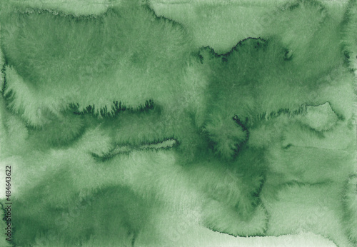 Abstract green watercolor background texture, hand painted. Artistic emerald color backdrop, stains on paper. Aquarelle painting wallpaper.