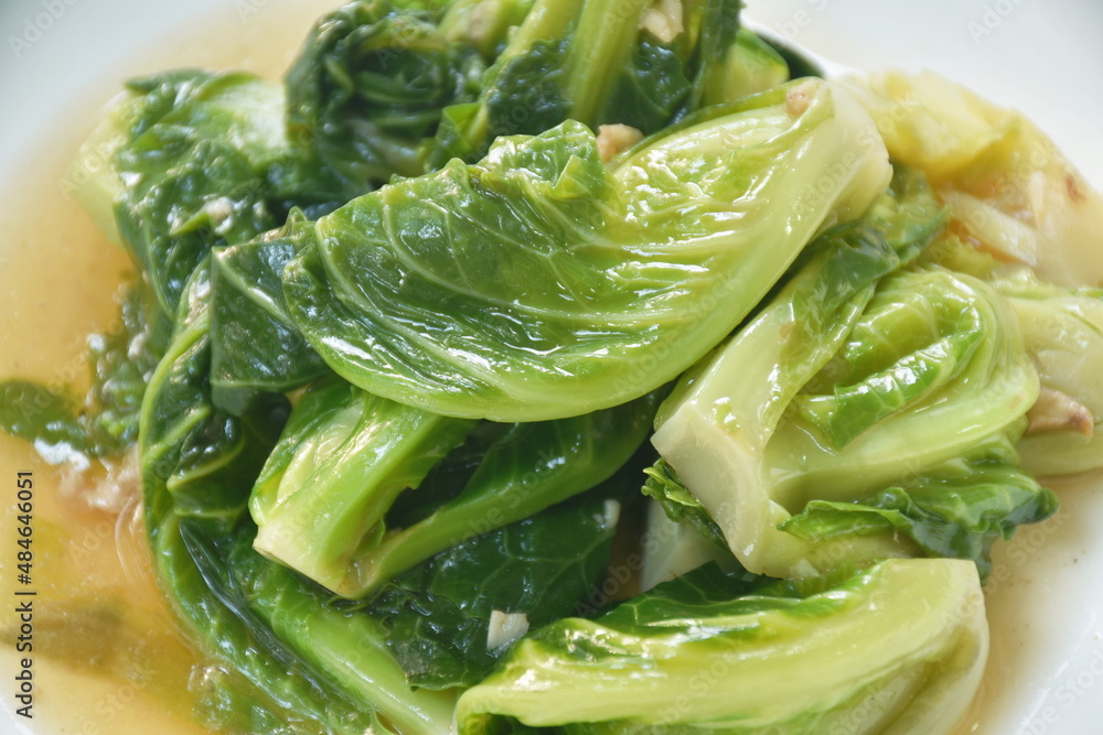 fried Brussels sprout in oyster sauce on plate