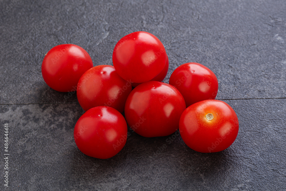 Ripe juicy cherry tomatoes heap Ripe juicy cherry tomatoes heap