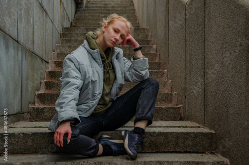 person sitting on stairs