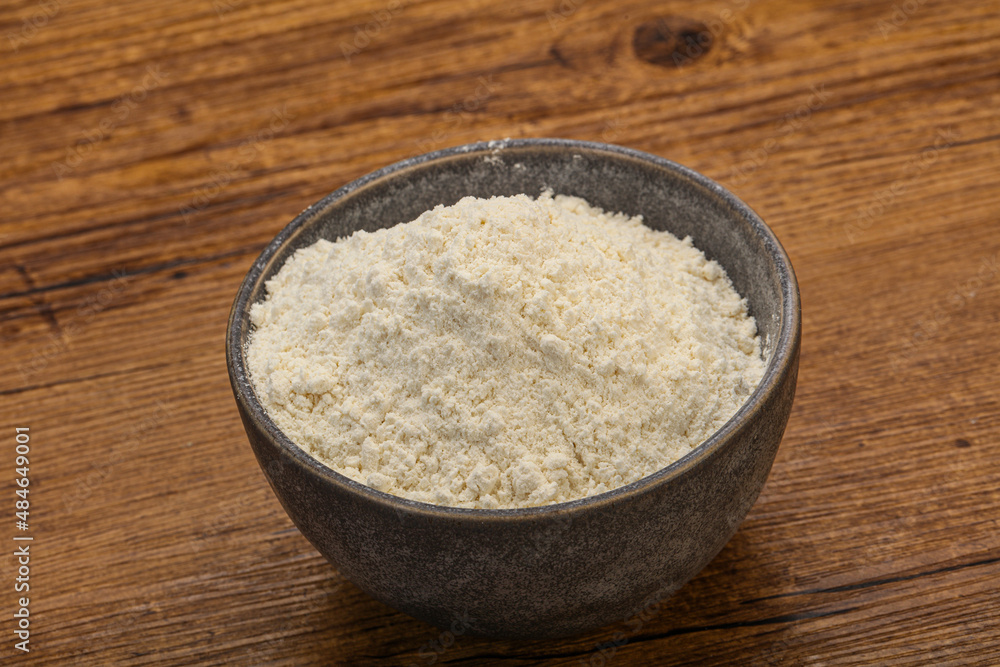 Wheat flour heap in the bowl