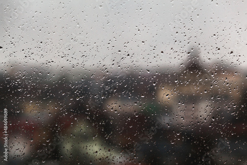 Rain on window. Raindrops on the glass. Rainy cold weather.
