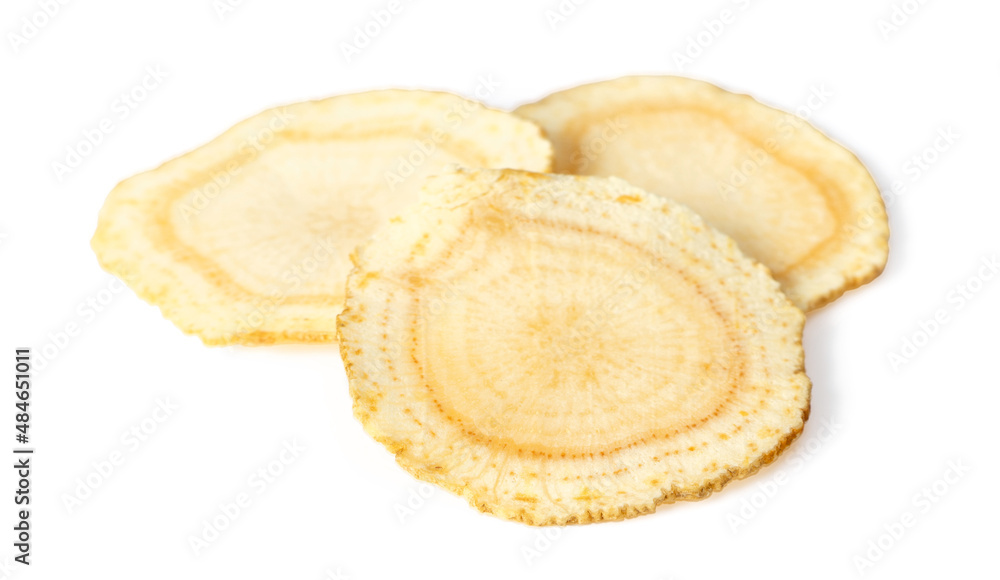 American ginseng slices isolated on the white background. American ginseng slices isolated on the white background.