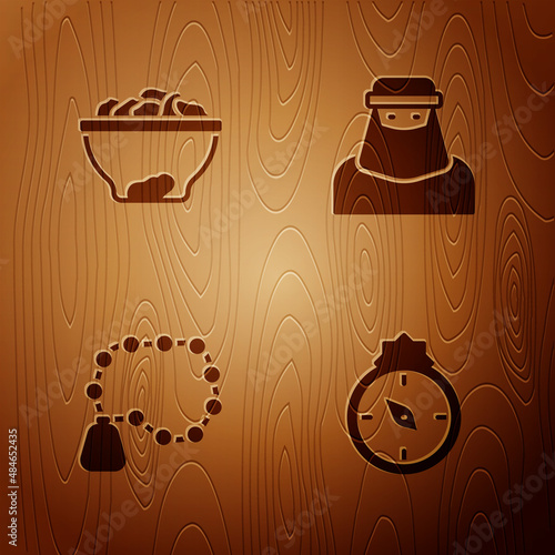 Set Qibla, Date fruit in bowl, Rosary beads religion and Muslim woman niqab on wooden background. Vector