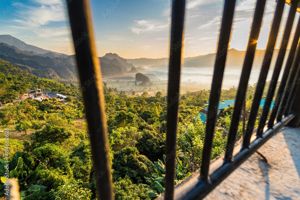 Fototapeta premium Sunrise and The Mist with Mountain Background , Landscape at Phu Langka, Payao Province, Thailand.