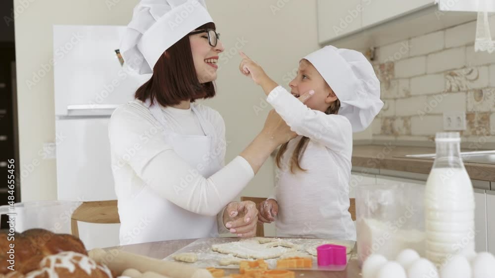 Having Fun While Cooking Concept. Portrait of happy caucasian mom and ...