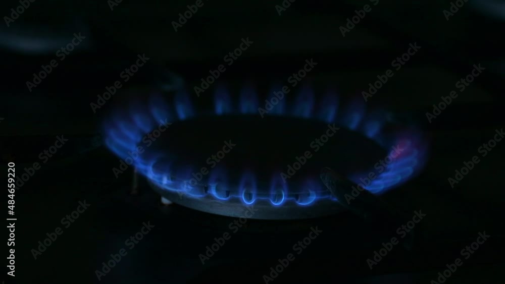 Constant burning of gas, blue flame of the gas stove burner. Constant burning of gas, blue flame of the gas stove burner.
