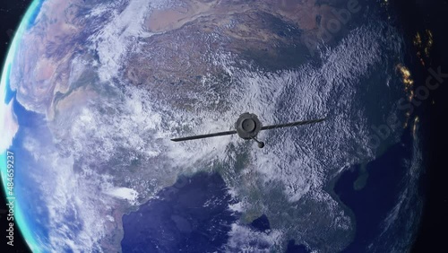 Satellite orbiting the Earth planet. View from spacial travel. 4K. 