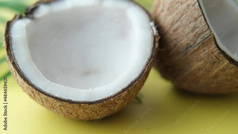 slice of fresh coconut on a table cloth 