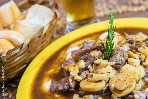meat and mushrooms on a plate