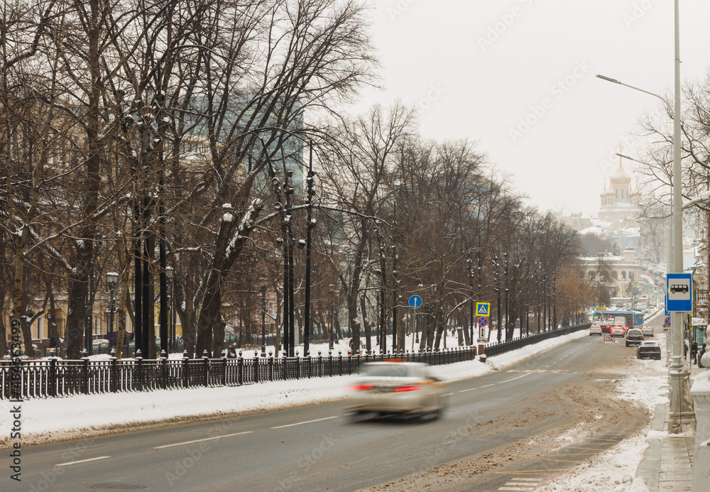 Moscow, Russia, Jan 21, 2022:  Cars riding at Petrovsky boulevard. Snow