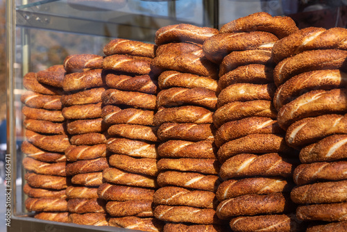 Freshly backed bagels with sesame seeds (simit) on a street stall for sale at Istanbul, Turkey