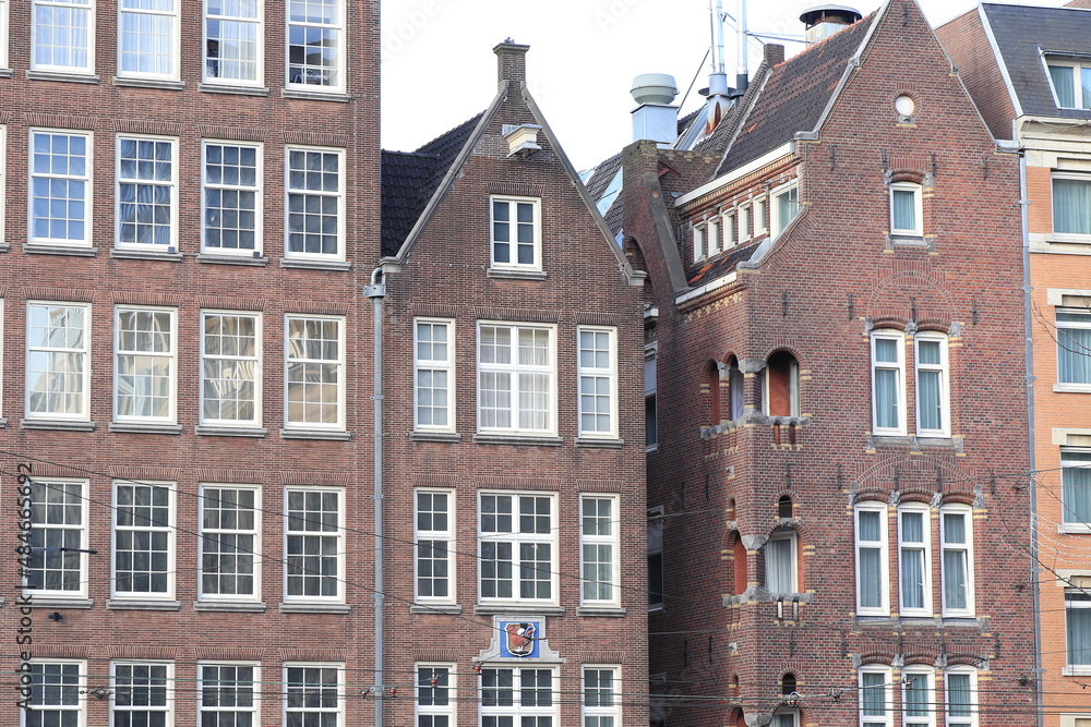 Amsterdam Damrak Street Brick Building Facades, Netherlands