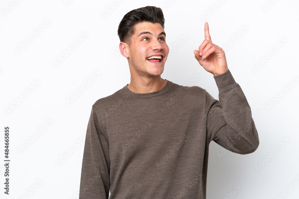 Young handsome caucasian man isolated on white bakcground intending to realizes the solution while lifting a finger up Young handsome caucasian man isolated on white bakcground intending to realizes the solution while lifting a finger up