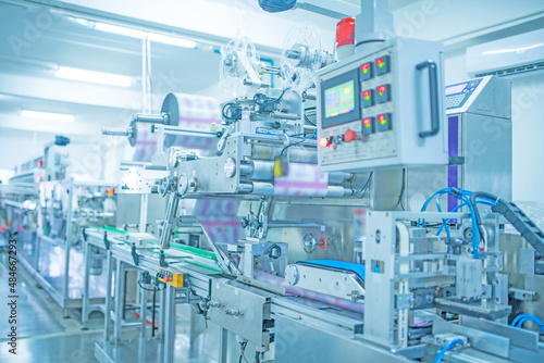 factory, industrial area, automation, technology, Machines for packing products Within the factory, sterile beauty industry in order to maintain maximum cleanliness.shallow focus effect..