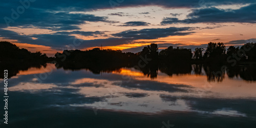 Beautiful sunset with reflections near Plattling, Isar, Bavaria, Germany