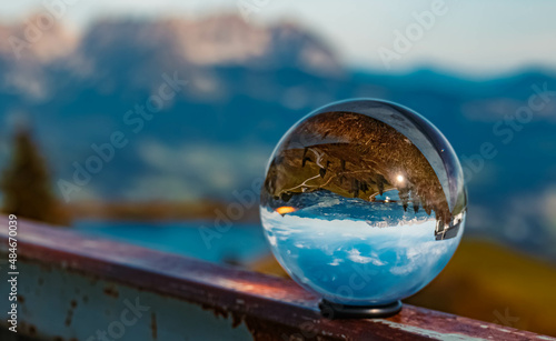 Crystal ball alpine landscape shot at the famous Fleckalm near Kitzbuehel, Tyrol, Austria © Martin Erdniss