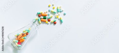 science pills and bottles on white background, Medical: Pills and bottle, aerial view. Composition of the medical flasks 