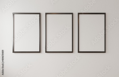 Empty photo frame hanging for mockup in empty white room. 3D rendering.