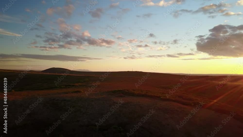 Aerial Panning Scenic Shot Of Natural Hills Landscape During Sunset - Saint Mary's, Alaska Aerial Panning Scenic Shot Of Natural Hills Landscape During Sunset - Saint Mary's, Alaska