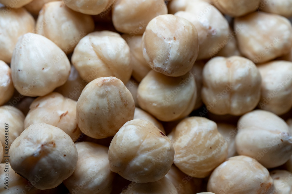 close up of a pile of hazelnuts close up of a pile of hazelnuts