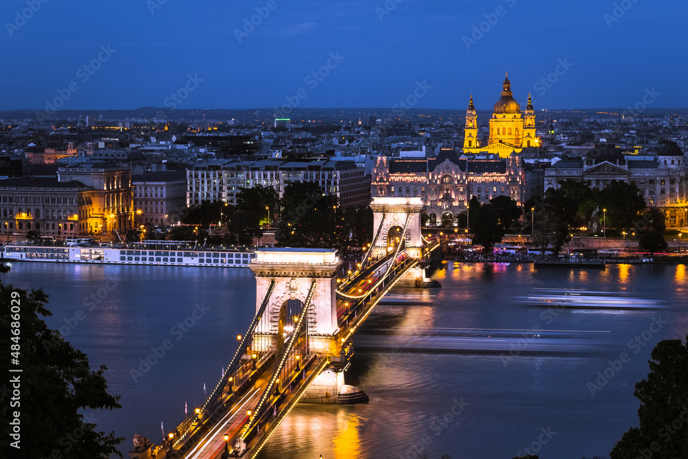 Nocturnal panorama of Budapest with Chain Bridge across Danube River. Hungary.