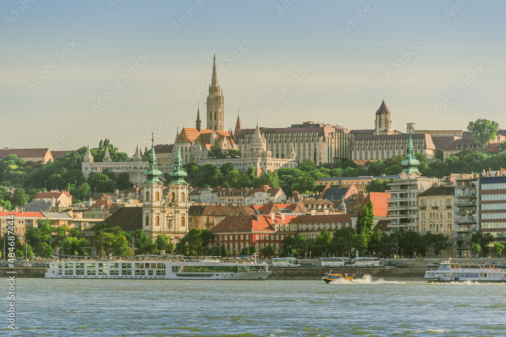 Budapest cityscape with landmarks on the hill on the Danube shore.